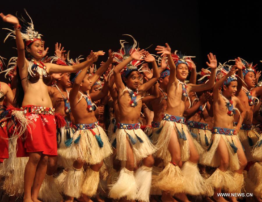 Cook Islands youngsters perform during the opening ceremony of the 43rd Pacific Islands Forum at the National Auditorium in Rarotonga, Cook Islands, Aug. 28, 2012. Photo by Xinhua:Huang Xingwei