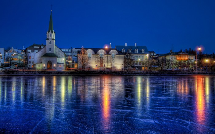 Reykjavik at night. Photo credit not found. TravelSeeLove.com does not claim any rights whatsoever to this image.
