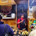 Meal time during a local festival in Quito, Ecuador